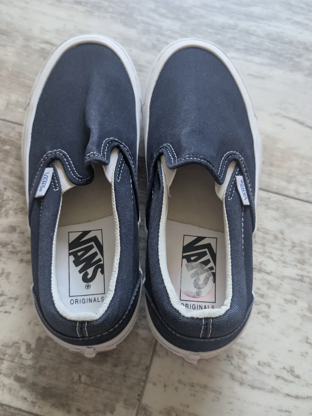 Vans Slip-On Sneakers in Navy and White